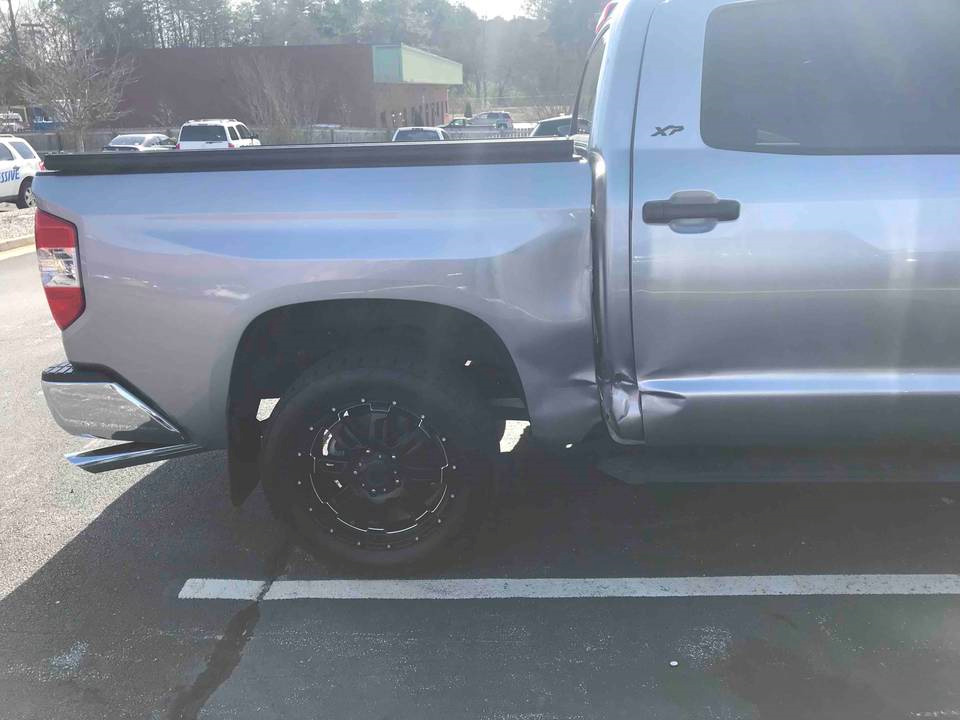 Close-up of the damage to a Toyota Tundra