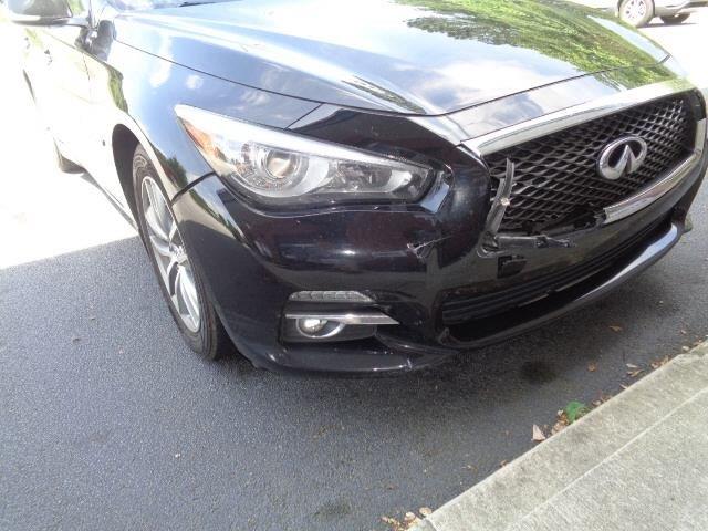 Damage was done to the front side of the Infinity Q50 before restoration.